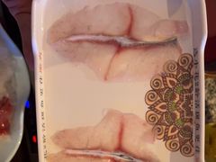 -老牌坊云南鱼豆花火锅(哈西万达店)