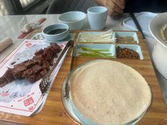 -乔家小院•非遗驴肉•本地小海鲜(滨河路店)