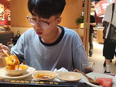 -老牌坊云南鱼豆花火锅(哈西万达店)