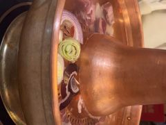 -毛辣果·贵州红酸汤牛肉火锅(西单店)