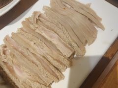 -明何记涮牛肚(品牌首店隋唐植物园南门古城路店)