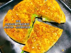 -明何记涮牛肚(品牌首店隋唐植物园南门古城路店)