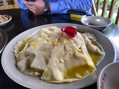 -茅草房·河畔园林火锅