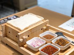 揭包卤水豆腐-天怡興·百年蒸饺(中心书城店)