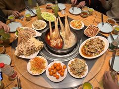 -明何记涮牛肚(品牌首店隋唐植物园南门古城路店)