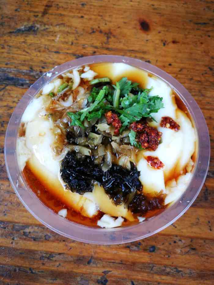 西施豆腐花(山塘街店)-"[薄荷]环境: 远远望去还蛮好看的,一旗.