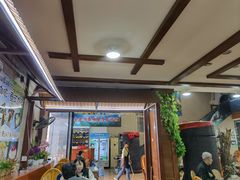 -沐毫傣泐云南菜孔雀宴•手抓饭傣味烧烤(曼听公园店)
