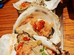 蒜蓉烤生蚝-金太阳海鲜烧烤·本地人餐厅(星海公园店)