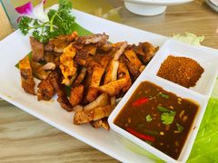 烤五花肉-金塔傣乡·云南民族特色菜·傣味手抓饭(金瓦路店)