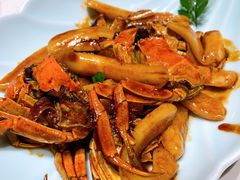 梭子蟹炒年糕-卯时·龙光雅宴·精致锡帮菜(惠山古镇店)