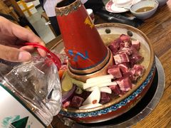 -毛辣果·贵州红酸汤牛肉火锅(西单店)