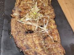 -明何记涮牛肚(品牌首店隋唐植物园南门古城路店)