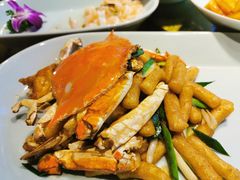 梭子蟹炒年糕-杭百味·大众精选杭帮菜(西湖音乐喷泉店)