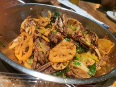 爆辣干锅鸭头-安诚居干锅鸭头(八角店)