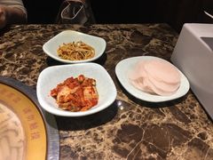 腌萝卜片-猪啊牛呀羊啊铜盘烤肉(正大广场店)