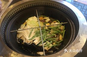 Stewed Pork Ribs and Chicken in Iron Pot