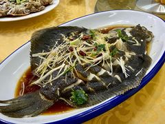 清蒸多宝鱼-1910老鲁味海鲜·戳子肉·青岛菜(金沙滩店)