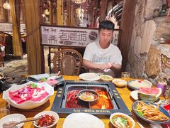 -老牌坊云南鱼豆花火锅(哈西万达店)
