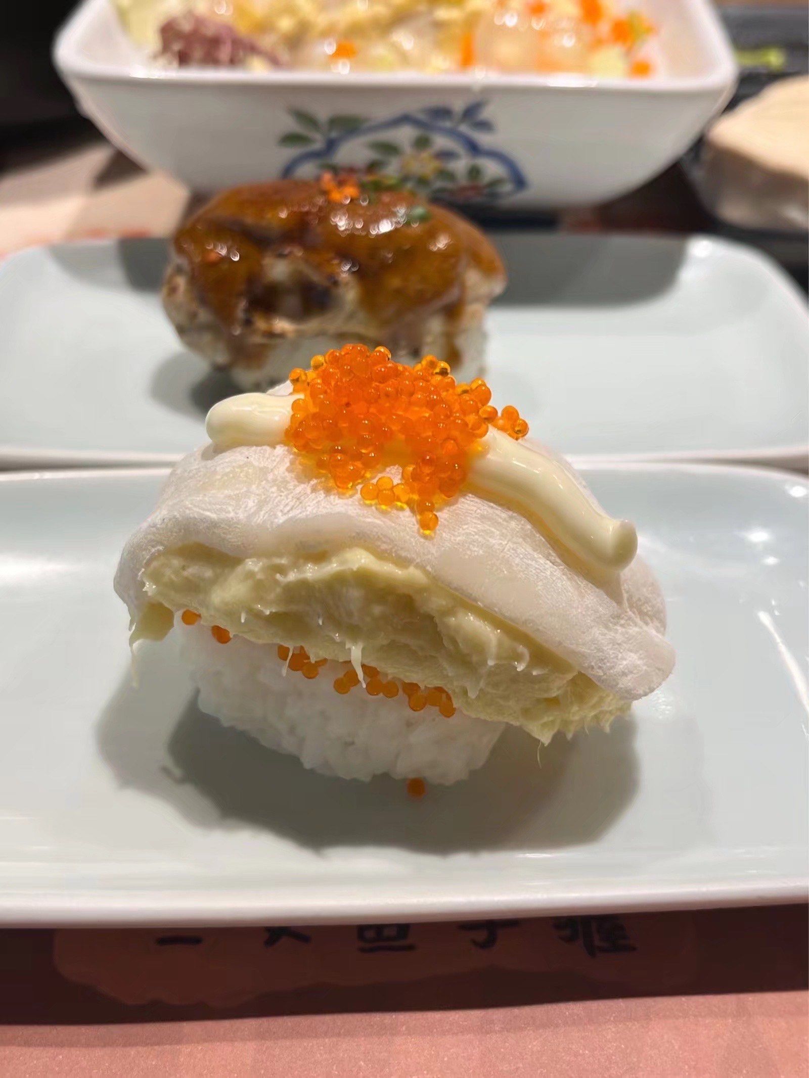 第一次吃榴莲寿司我是不屑的,直到这一口下去