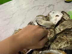 -蚝哥花姐湛江烤生蚝(美丽湾市场店)