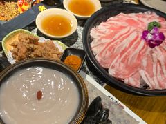 -老牌坊云南鱼豆花火锅(哈西万达店)