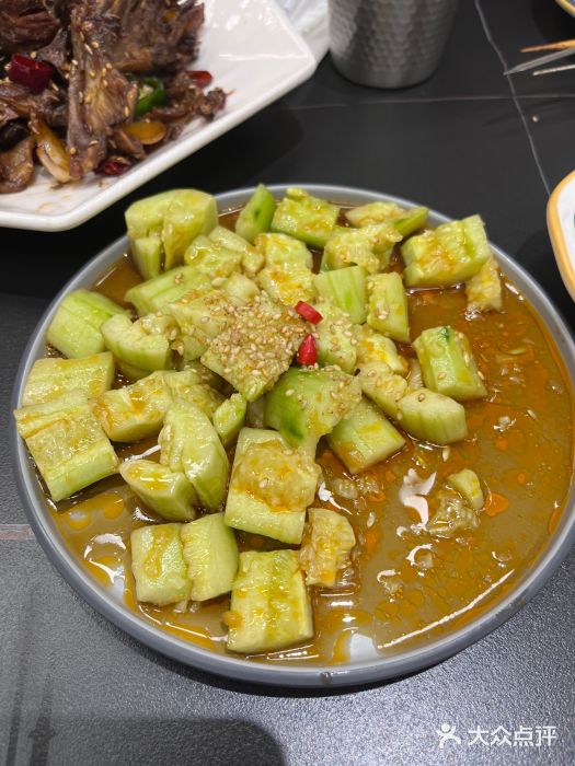 许哥东北烧烤·铁丳烤串·宫后夹肉(繁花中心店)图片