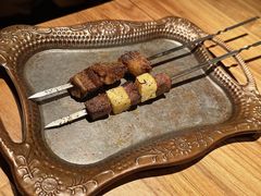 香烤牛舌-阿里家·新疆烤肉酒場 by MIG