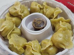 玉米面猪肉酸菜蒸饺-那家老院子东北菜·饺子·小鸡炖蘑菇(艳华街店)