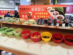 -明何记涮牛肚(品牌首店隋唐植物园南门古城路店)