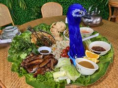 -沐毫傣泐云南菜孔雀宴•手抓饭傣味烧烤(曼听公园店)