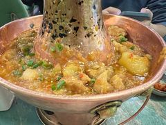 土司铜锅油焖鸡-浩海火烧云傣家菜(京广店)