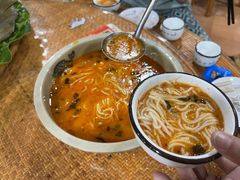 -沐毫傣泐云南菜孔雀宴•手抓饭傣味烧烤(曼听公园店)