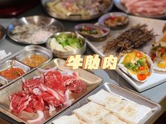 -围炉肉舍•炭烤活鳗•丹东海鲜烤肉(步行街店)