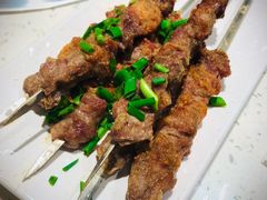 烤羊肉串-三人行骨头王火锅(长寿店)