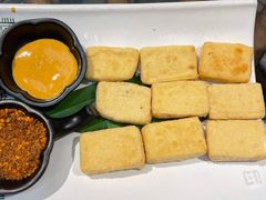 香煎石屏豆腐-云海肴·汽锅鸡·云南代表菜(天山百盛优客店)