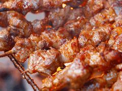 纯手工羊肉串-聚串门儿·东北烧烤(信义坊店)