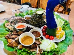 -沐毫傣泐云南菜孔雀宴•手抓饭傣味烧烤(曼听公园店)