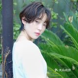 可爱蓬松的短发滊发与清爽的露耳短发搭配起来