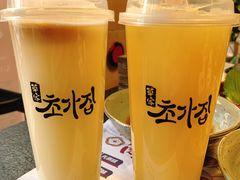 百香果养乐多-草家酱蟹炭火烤肉店(珲春南路一店)