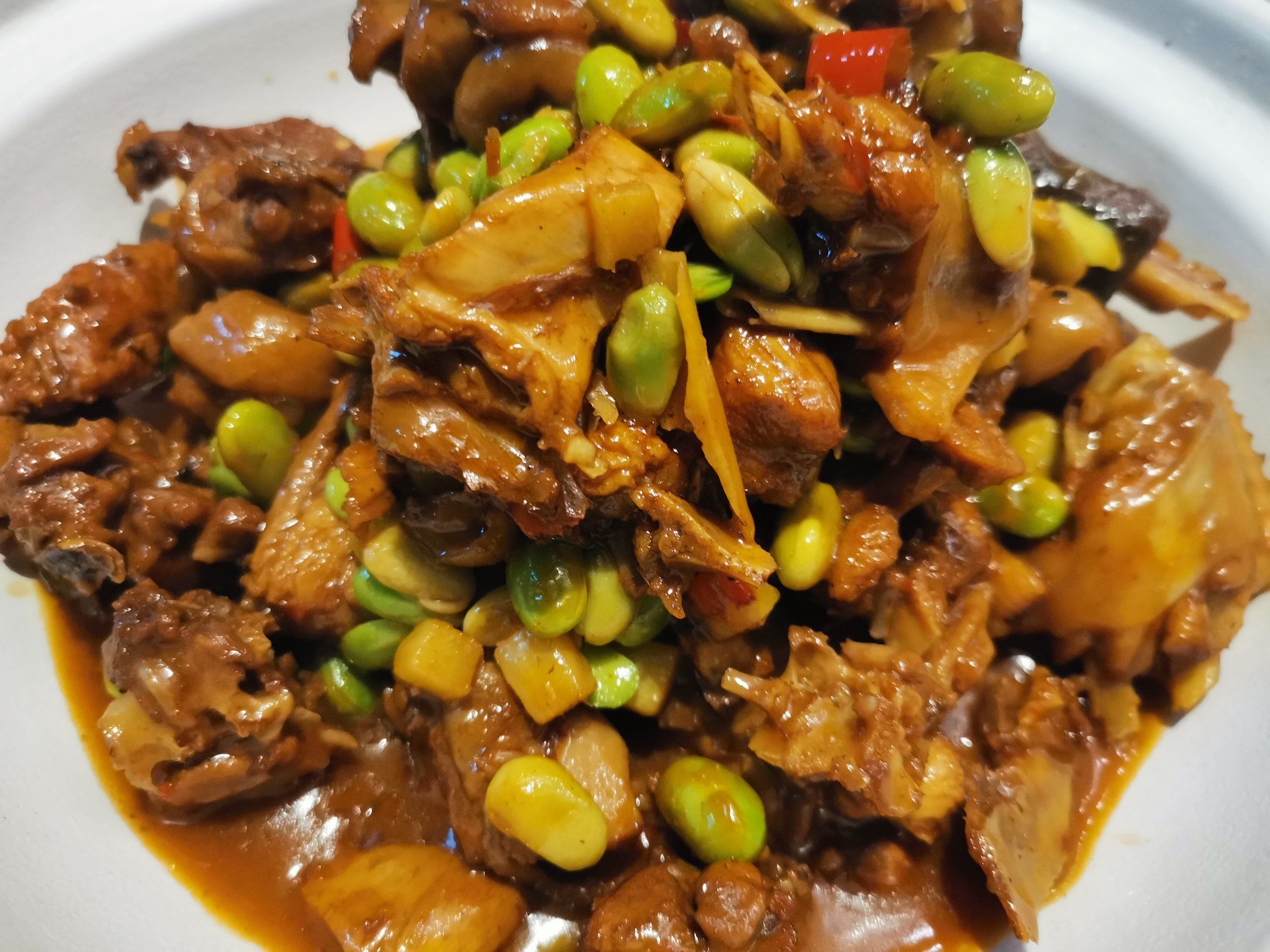 毛豆米烧土公鸡之所以好吃,不仅仅在于其令