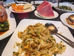 海味招牌炒年糕-海味世家·家常菜馆(明州里店)