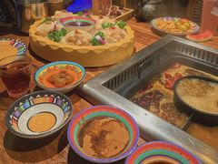 -老牌坊云南鱼豆花火锅(哈西万达店)