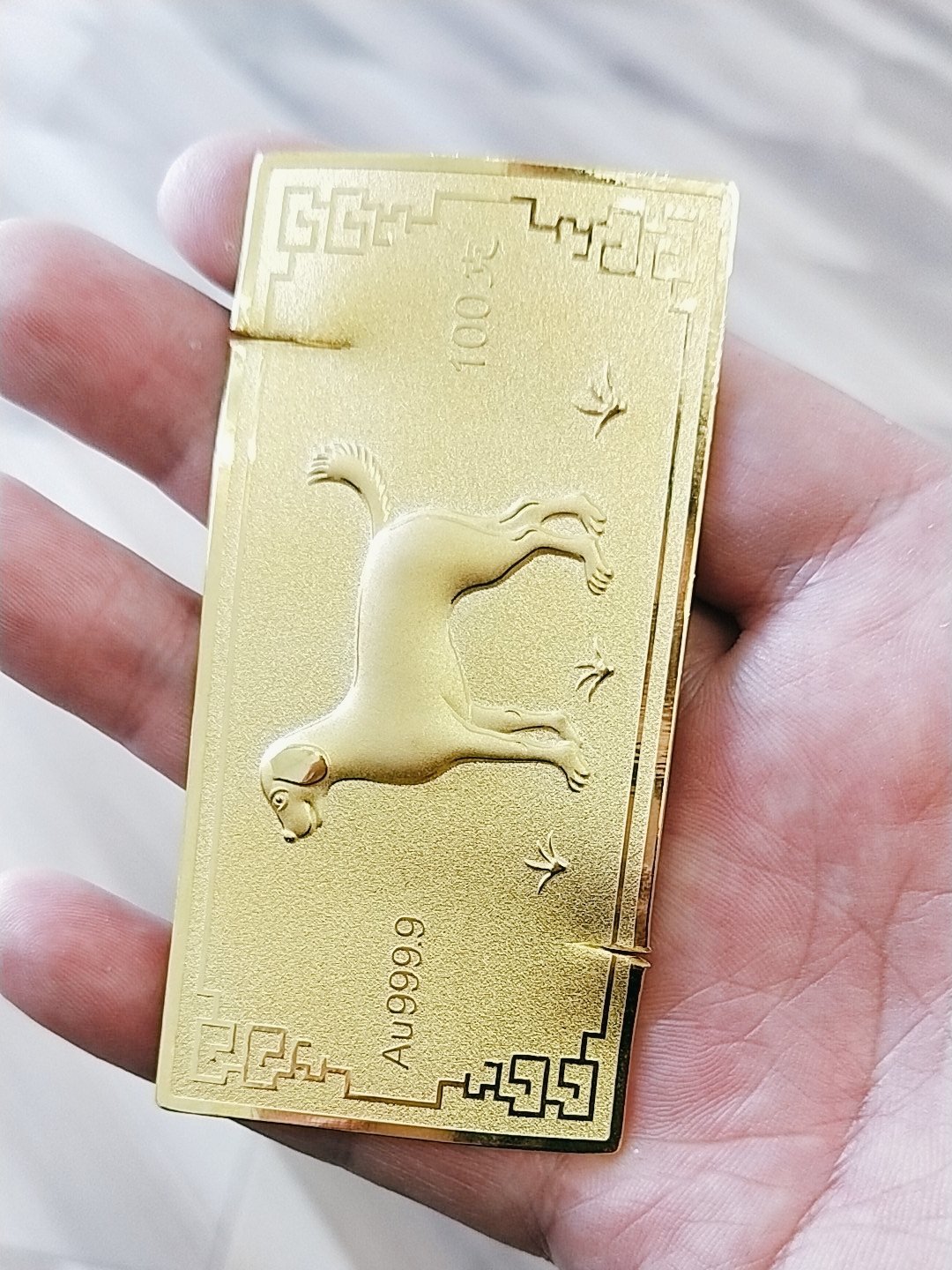 出手了一百克周大福金条