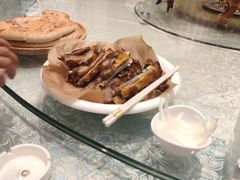 馕坑果木烤羊排-巴扎美食·新疆菜·西域歌舞表演餐厅(新疆大厦店)