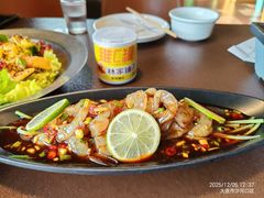 -曼听小寨海鲜烧烤·大连辣炒大王(盖州街店)