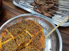 隔壁店的蒜蓉烤馕-清真·马峰烤肉(小学习北巷店)