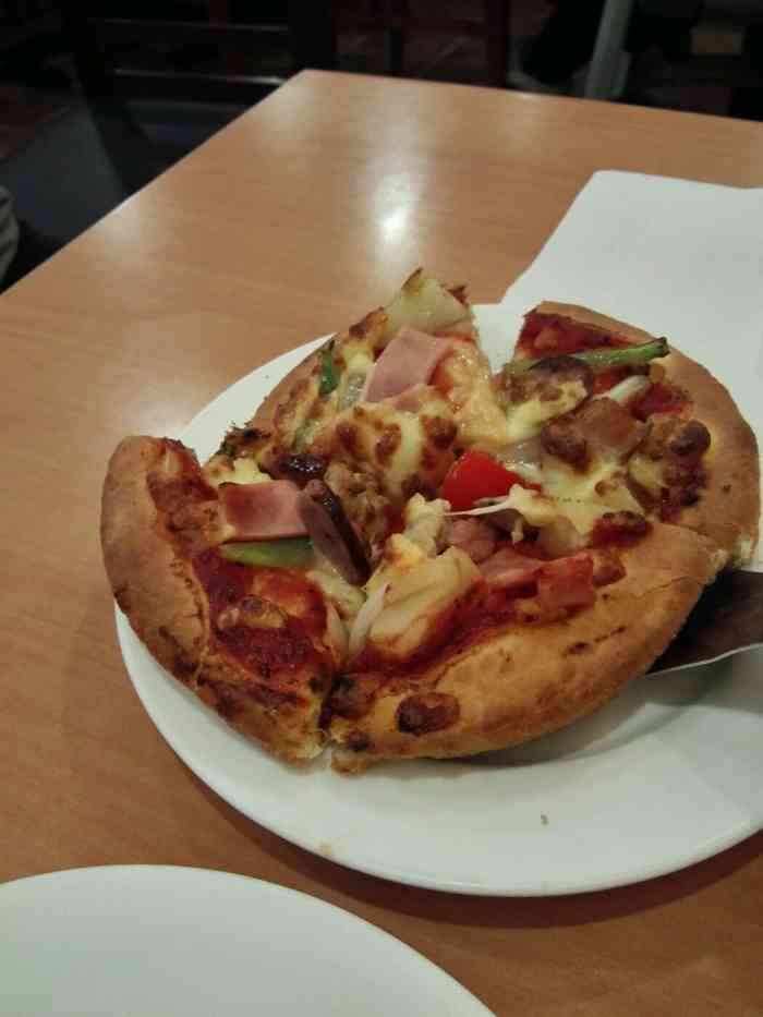 品奇比萨(新奥店)-"他家现在有活动,铁盘披萨买一赠一,很划算.