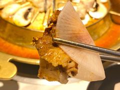 腌萝卜片-猪啊牛呀羊啊铜盘烤肉(正大广场店)