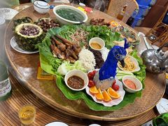 -沐毫傣泐云南菜孔雀宴•手抓饭傣味烧烤(曼听公园店)
