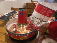 -毛辣果·贵州红酸汤牛肉火锅(西单店)